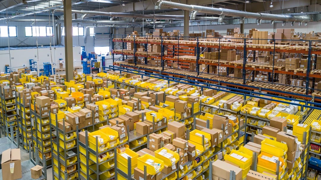 A facility full of boxes on shelves.