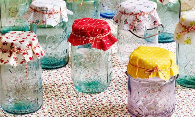 Multiple mason jars with tops