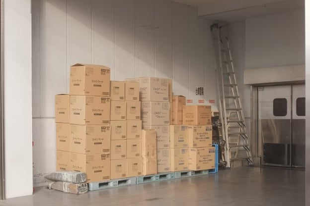 Several stacked packages at the end of the contract packaging process.