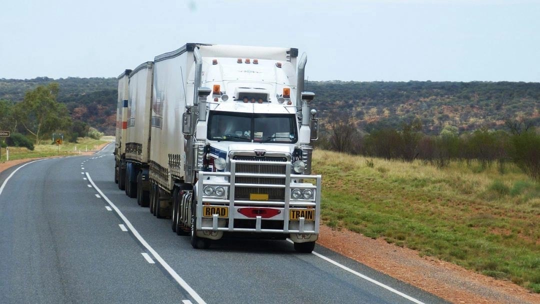 A semi-truck transporting goods.