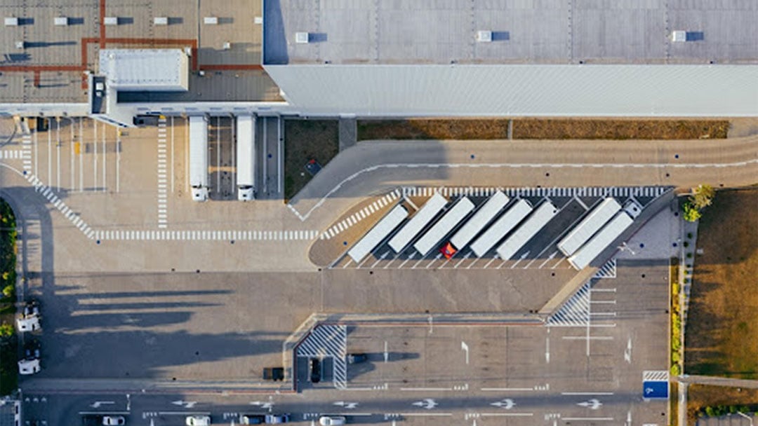 trucks-park-outside-a-warehouse